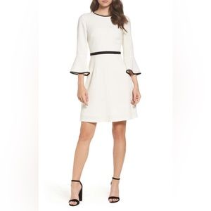 cinq a sept black and white long sleeve flounce pencil dress